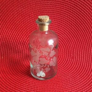 Decorative Vintage Green Glass Bath Bottle with Etching and cork closure.